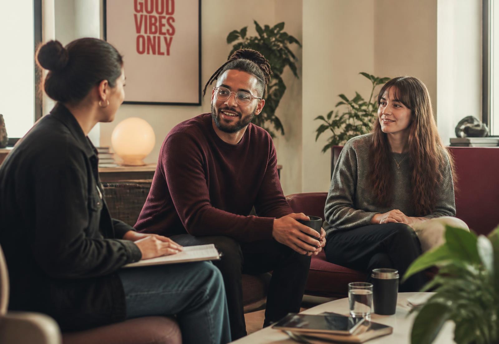 A warm, casual workplace lounge set up for a small group session